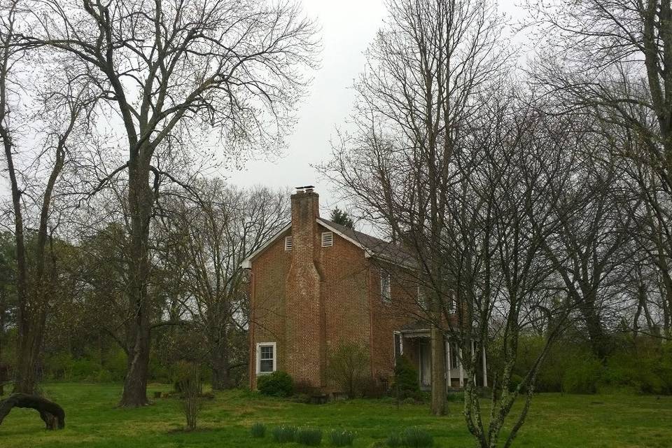UUCL's Allen House, the second oldest building in Fayette County, can serve as a lovely backdrop for photos or even an outdoor ceremony.