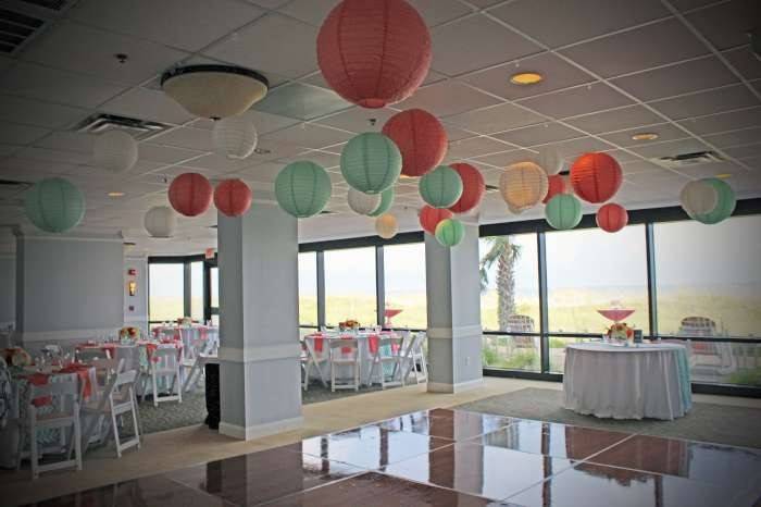 A Elegant Coral and Mint Green Beach Front Ballroom Wedding.