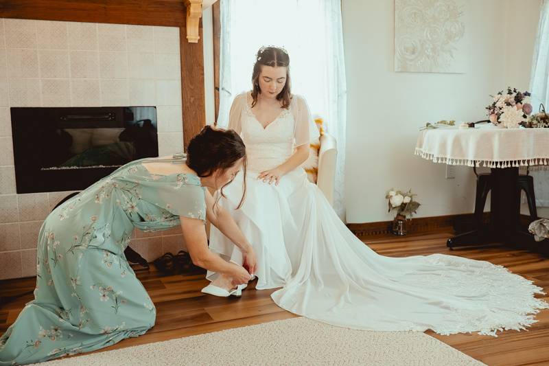 Mother of Bride helps bride