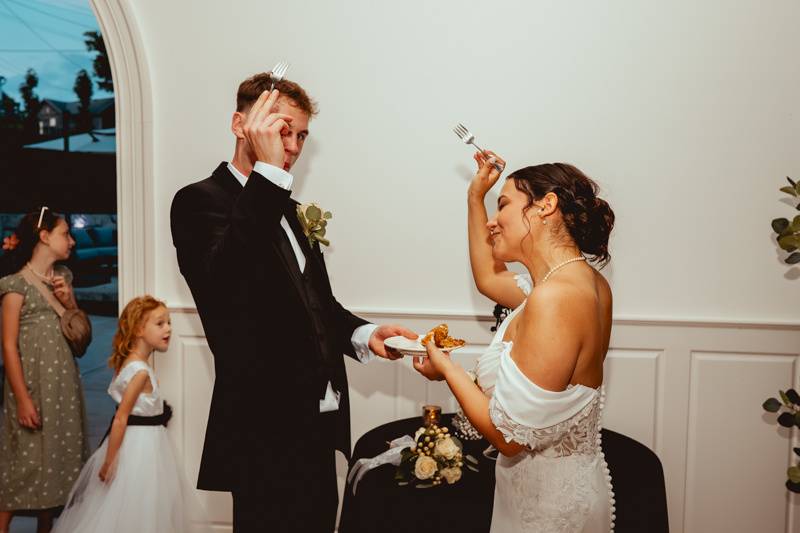 Bride & groom cut cake