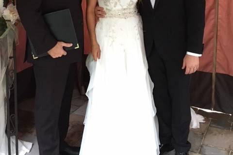 Newlyweds with the officiant