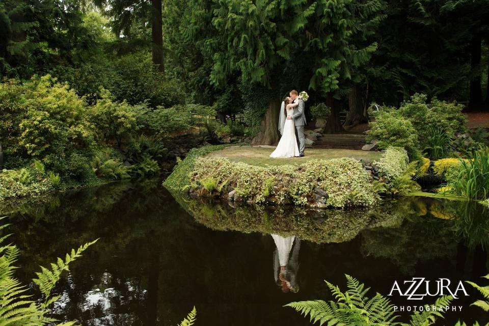 Newlyweds by the pond