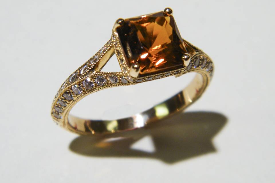 Another estate ring: a fantastic Maderia citrine set in yellow gold with diamonds along the band.