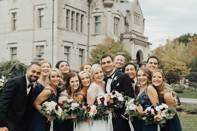 The couple with the bridesmaids and groomsmen
