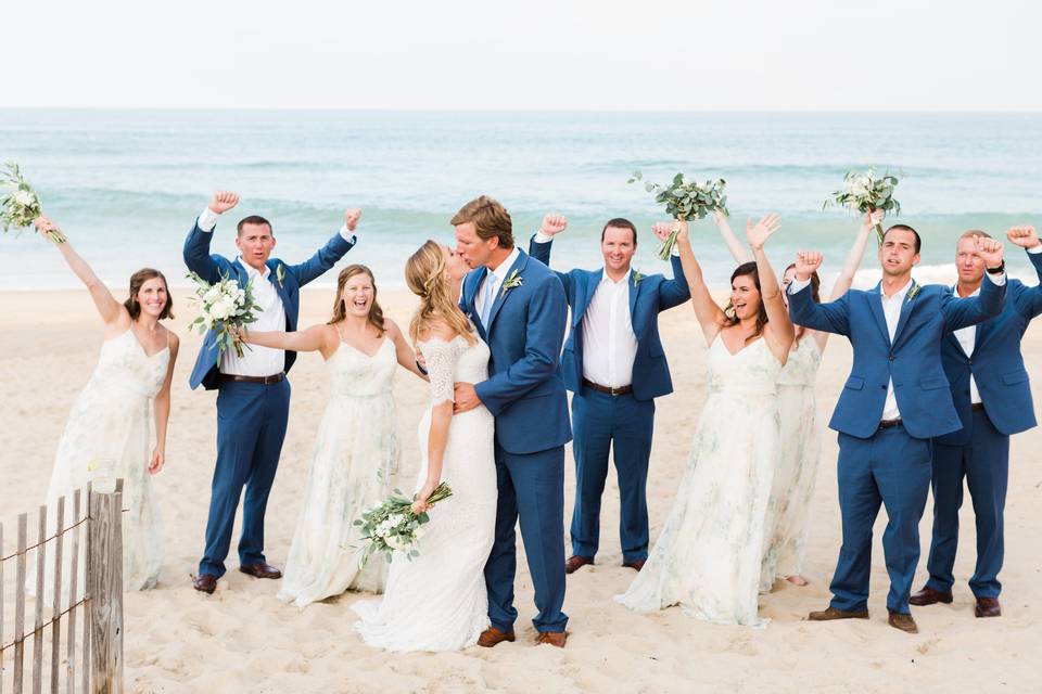 The couple with the bridesmaids and groomsmen