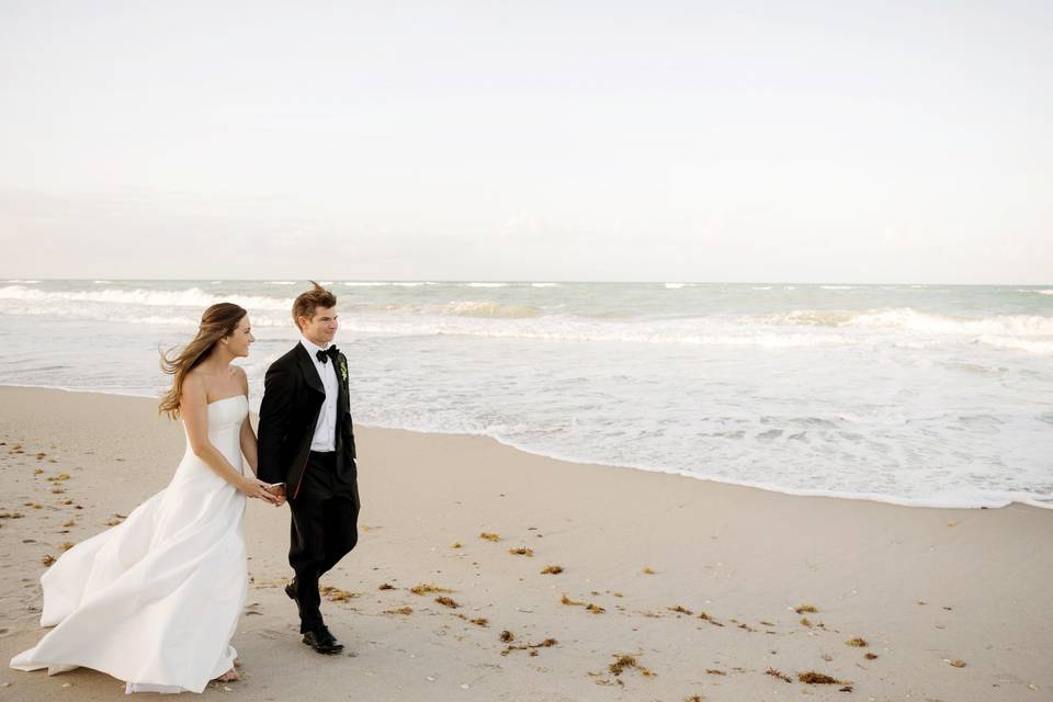 Bride and groom on beach