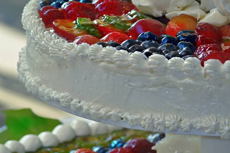 Close Up of Glazed Fruit atop a Cheesecake Wedding Cake