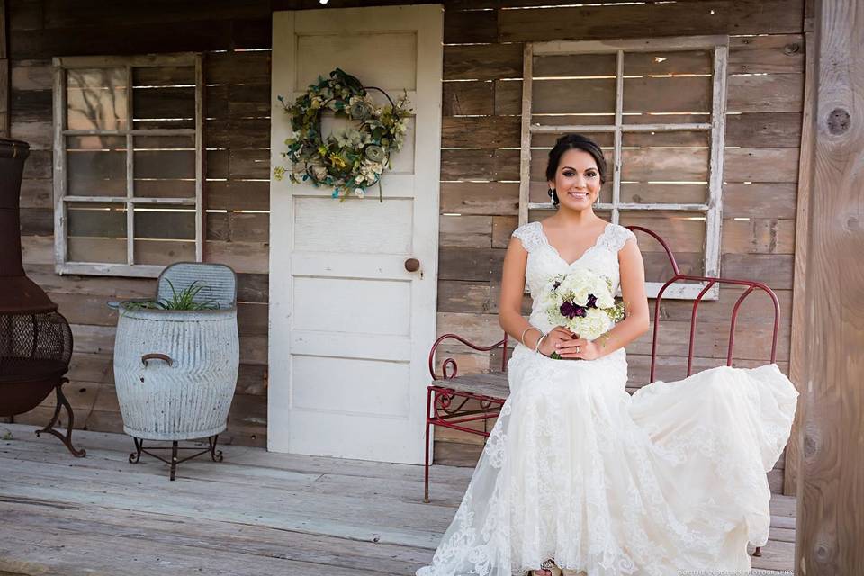 Bride posing with her bouquet