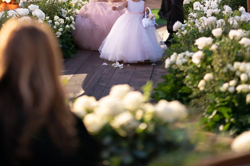 Flower girl on luxury aisle