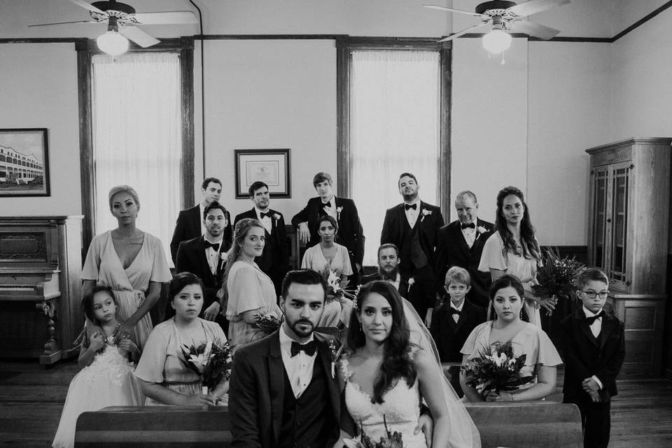 Newlyweds and their wedding party | Photo by Oak and Iron Photo