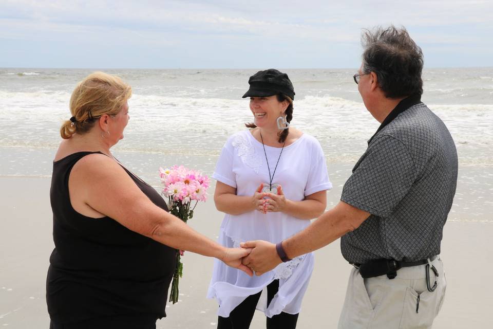 Super casual, fun ceremony with friends and family on the beach.