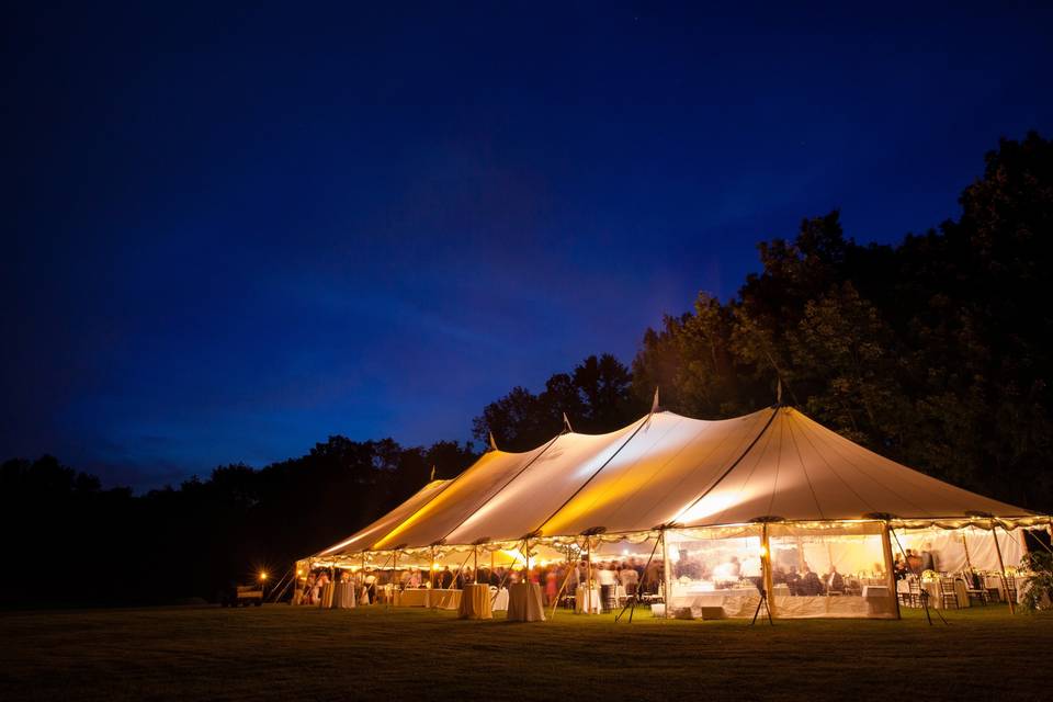 The tented field at night
