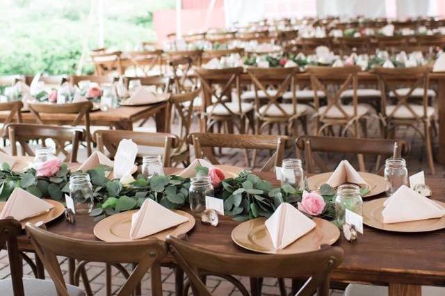 Tent setup for outdoor wedding | Photo: Brittney Livingston