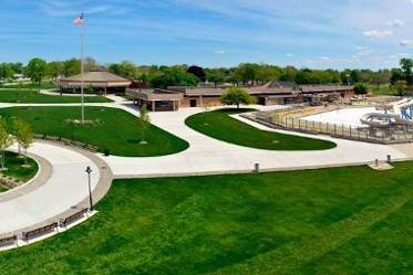 A view from above! This panoramic shot features the Thomas Welsh Activity Center situated in the plaza at Lake St. Clair Metropark. The small stage area pictured front is a public area that is perfect for ceremonies and pictures. This shot was taken as the leaves emerged in mid-May.