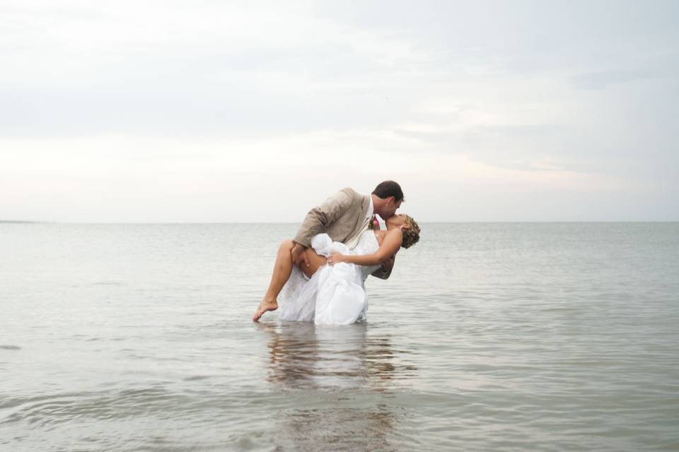 Newlyweds kissing