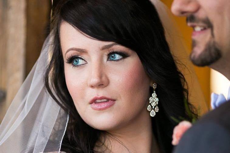 Beautiful bride with striking blue eyes | The Mill Photography