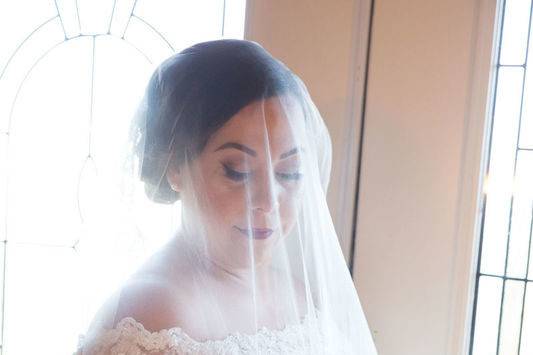 Bride wearing her veil