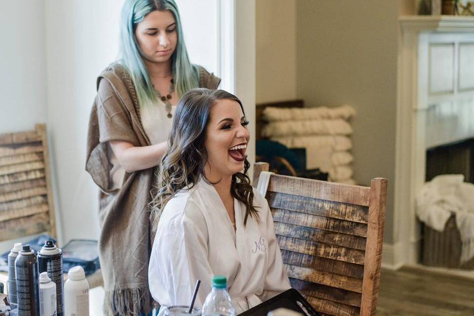 Bride getting her hair styled