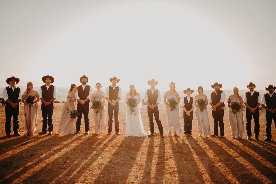 Newlyweds and their wedding party