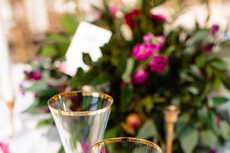 Gold rimmed glassware from expo party rentals