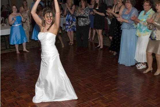 The bride tosses her bouquet