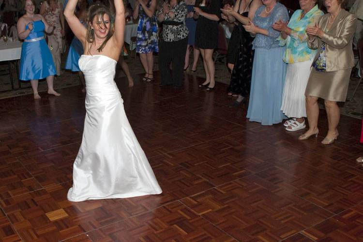 The bride tosses her bouquet