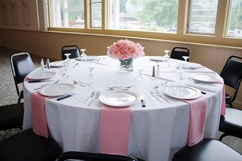 Table setup with flower centerpiece