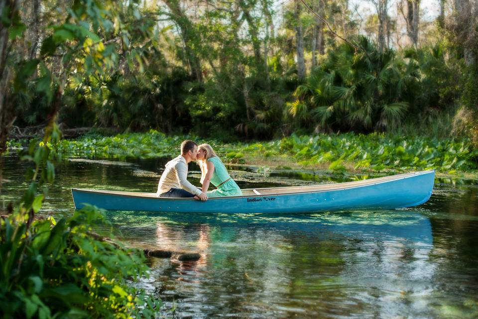 Couple kissing in the boat