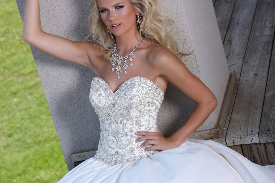 DaVinci Bridal Style #: 50251
Satin ball gown featuring a sweetheart strapless neckline with bodice covered in delicate beading.  Zipper back and chapel length train.