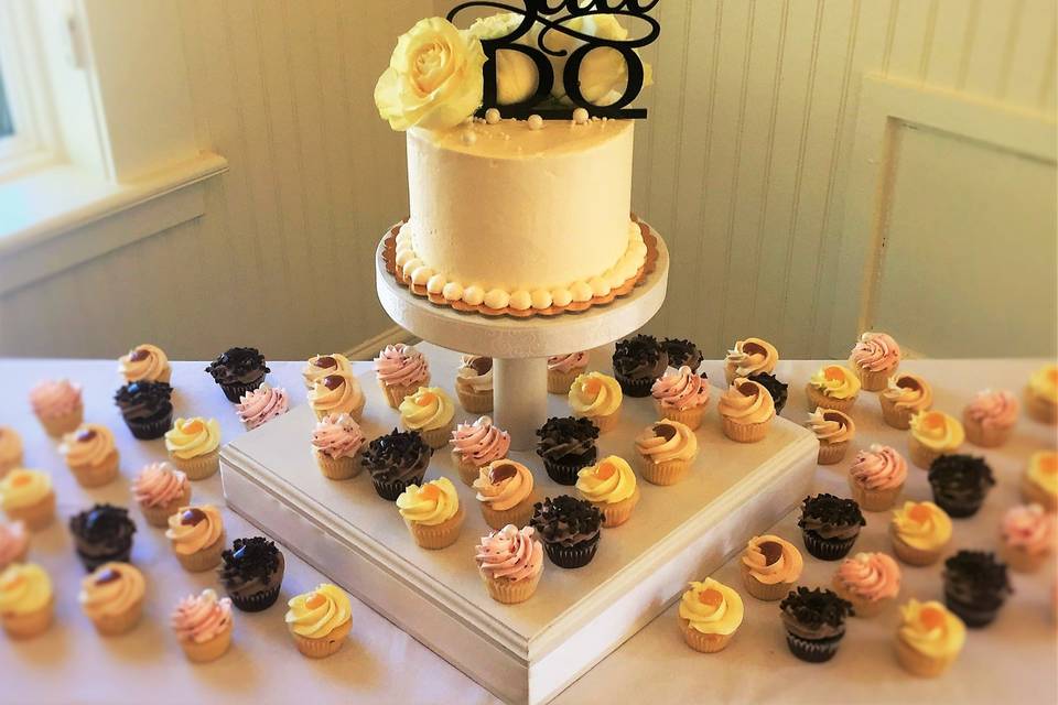 Wedding cake and cupcakes