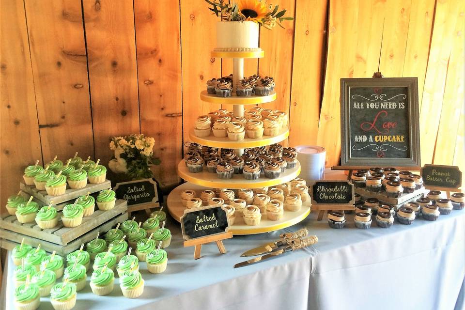 Wedding cake and cupcakes