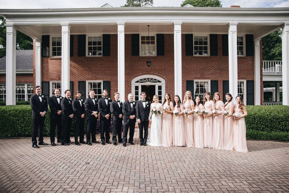 Bridal Party in front of the venue Photo by M. Fehr Photography