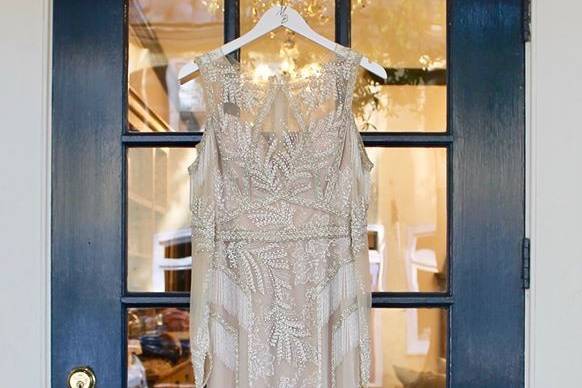 Ornate gown hanging on front door