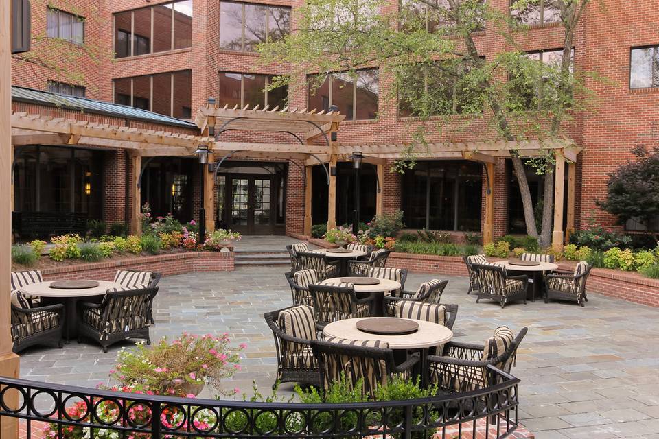 Pergola Covered Walkway leading to Garden Courtyard at DoubleTree Suites by Hilton Charlotte SouthPark