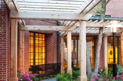 Pergola Covered Walkway leading to Garden Courtyard at DoubleTree Suites by Hilton Charlotte SouthPark