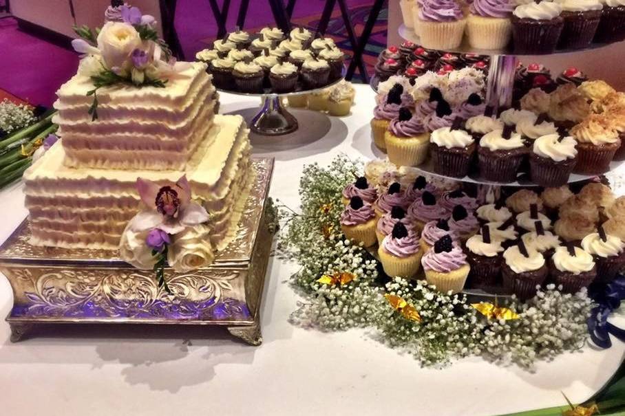 Wedding cake and cupcakes