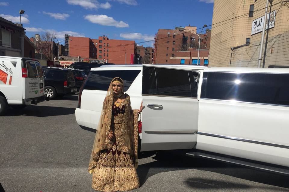 The gentleman looking dapper in front of our 12-passenger Cadillac Esacalade