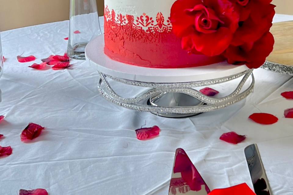 Red and white stencil cake