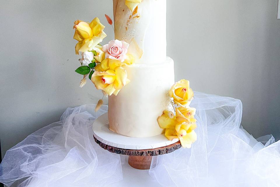 Yellow & white wedding cake