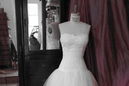 Stunning strapless hand stitched lace bodice with a hemp/silk lining and tulle skirt