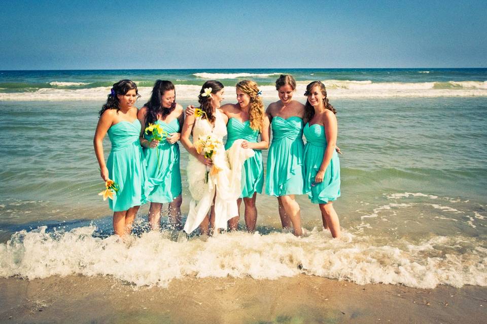 Bridesmaids in the ocean
