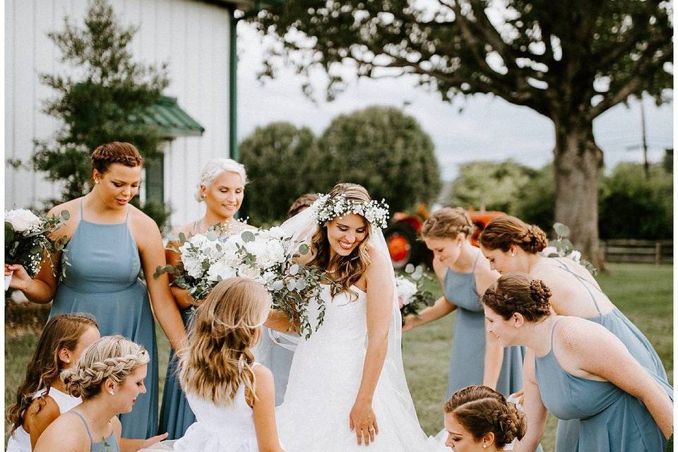 Bridesmaids helping the bride | Sarah Mosher Photography