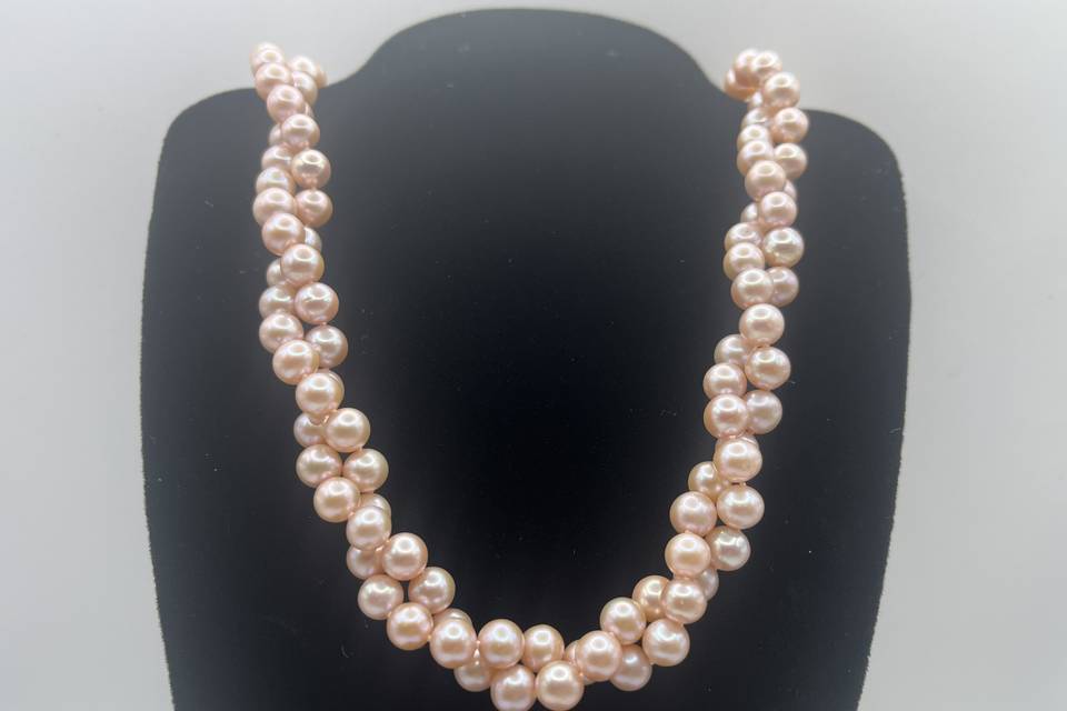 Twisted pearl strands