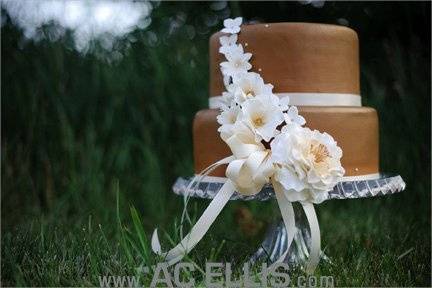 Gold cake with sugar flowers | Photo by AC Ellis