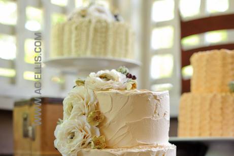 White wedding cake with white flowers