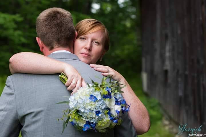 Bride embracing her groom