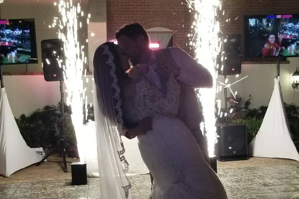 First dance & sparkler fountains in the background