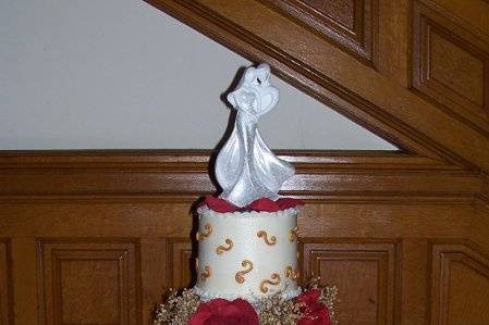 Red Silk Roses and Gold Scrolls. Red Velvet cake.