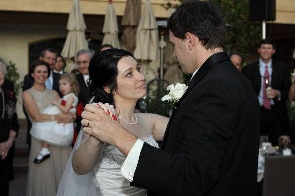 Matt and Laura's first dance took place in the courtyard outside Bocaccio's restaurant.