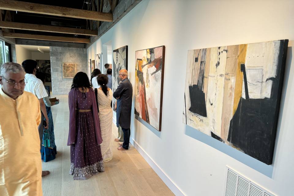 Guests mingling in gallery